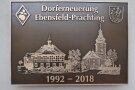 Bronzetafel zur Erinnerung an die Dorferneuerung