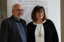 Ein Mann und eine Frau in Portraitaufnahme